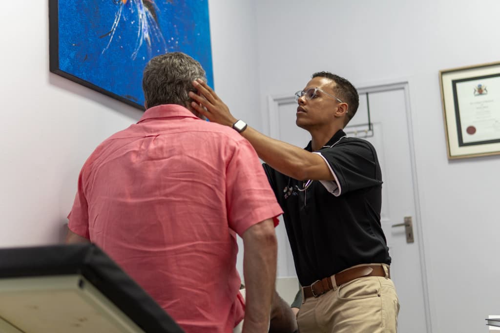 Dr Chellan during a patient examination.